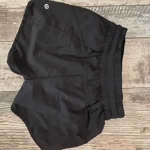 Black Lululemon tracker shorts 4” size 4